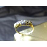 5 Stone diamond ring set in 18ct Gold. Weight 2.3g, size M1/2