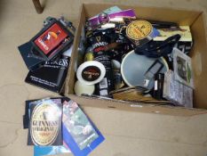 Box containing various Guiness collector items to include beer mats, Keyrings etc