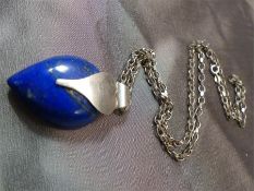 Silver (925) Lapis Lazuli Modernist Pendant, the tear drop shaped stone measures approx 27.5mm x