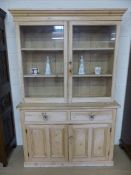 Antique pine dresser with cupboards under and glass fronted display over. Glass Handles to door