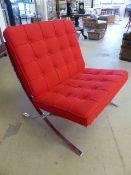 Red and Chrome Barcelona style chair. Newly re-upholstered red button back cushions.