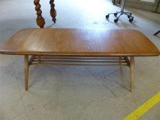 Low Ercol coffee table with magazine shelving under