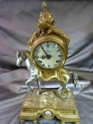 An 'Imperial' Italian Mantel Clock, surmounted on horse and brass mossy base with bun feet. (key