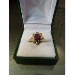 Vintage 18ct Yellow Gold Garnet and Diamond set cluster ring. Setting is a 'Flower head design' with