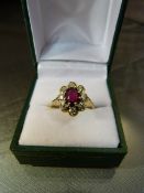 Vintage 18ct Yellow Gold Garnet and Diamond set cluster ring. Setting is a 'Flower head design' with