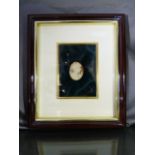 Signes Amalfi Cameo in frame, the female head sits in Green Velvet and faces to the right, she has