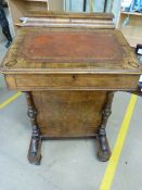 Edwardian inlaid mahogany davenport with red leather inset to lift top. Drawers to one side and