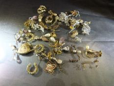 Large collection of scrap gold and silver earrings - pendants etc Total approx weight 63.7g