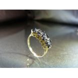 9ct Gold Dress ring of 4 Interlocking sapphire and Diamond Clusters with 4 approx 0.02pt Diamonds