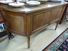 Low William and Mary inlaid sideboard on tapering legs with castors. Four inlaid doors