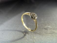 Vintage Gold (hallmark rubbed) white sapphire daisy cluster ring. Size approx UK - O and USA 7.25.