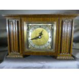 An Art Deco Elliot oak cased clock retailed by Flinn & Co Coventry