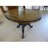 Edwardian inlaid mahogany oval table with carved tripod base