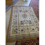 Turkish handwoven cloth on a Beige metallic ground. Tassled ends. Decorated with a floral border and