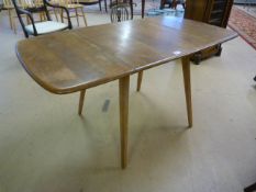 Blonde Ercol drop leaf dining table