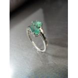 9ct White Gold emerald crossover ring set with two oval Emerald stones