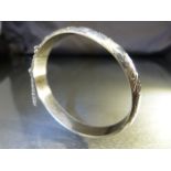 Hallmarked silver (925) bangle in the Art Nouveau style with safety chain - approx weight - 13.1g