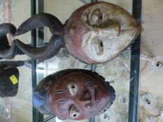 Two African Tribal masks - Yorouba Nigeria and a Kivele Gabon