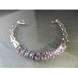 Silver (925) Amethyst Bracelet approx 7.5mm wide x 8" long, set with 11 pale Oval Amethysts