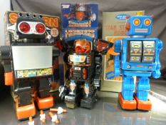 Three Vintage battery operated Robots in original boxes. To include a Japanese Star Strider Robot (