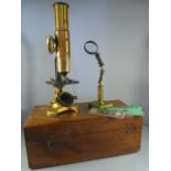 A Brass and lacquered two part tube telescope on Y framed stand - no makers mark and fitted to