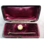 Original boxed 15ct Gold Diamond set stick pin/ Dress stud. The Approx 10pt old mine cut diamond