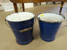 Two blue enamelled water / fire buckets with wooden handles