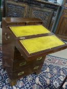 Modern brass bound campaign style chest of four drawers with writing slope to top