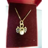 Silver gilt pendant set with cultured pearl