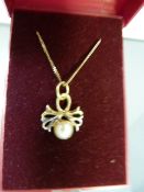 Silver gilt pendant set with cultured pearl