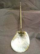 Small serving spoon with mother of Pearl bowl and Plated handle along with a Mother of pearl snuff