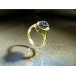Sapphire and CZ set Gold on silver dress ring. Weight 3.6g approx