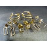 Four pairs of M&S gold earrings - Total weight approx 6.4g