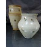 Early Poole Pottery vases (2). Two earthenware Poole Pottery vases decorated with 'sprigs' of