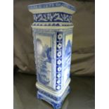 Modern Blue and white oriental transfer vase of rectangular form on a matching plinth. Blue