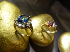 Two 9ct Gold gem stone cluster rings by QVC. (1) Central Sherry coloured emerald cut stone, with a