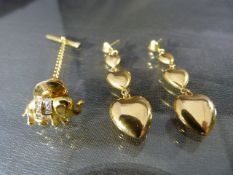 Bag of Yellow metal unmarked items: - Including a pair of 4 graduated heart earrings and an 18ct