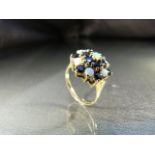 Vintage 9ct (1975) Gold Opal and Sapphire cluster dress ring. 7 Cabachon opals approx 3mm in