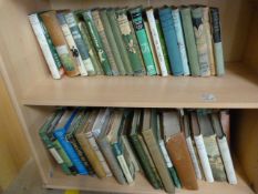 Collection of vintage Cricket books over two shelves