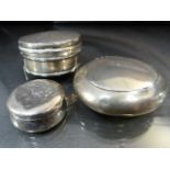 Three hallmarked silver items to include a pebble shaped snuff case and two silver pots. total