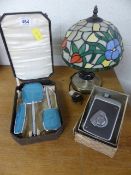 Boxed dressing table set in case, Kodak Brownie camera II and a Tiffany style lamp