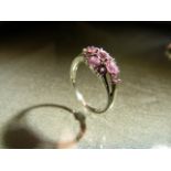 QVC 9ct White Gold pink sapphire and Diamond ring. 8 Oval Pink stone interspersed with 4 small