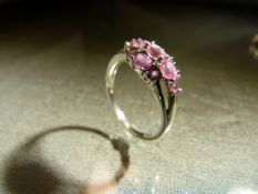 QVC 9ct White Gold pink sapphire and Diamond ring. 8 Oval Pink stone interspersed with 4 small