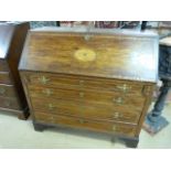 Edwardian Inlaid bureau with four drawers