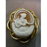 Large Victorian Pinchbeck, very fine brown Cameo Brooch depicting Erato playing her Lyre. Erato is