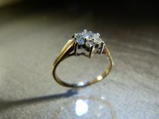 9ct Gold (Birmingham) 1983 Diamond Cluster Ring. Centre stone approx 10pts is surrounded by 6 approx