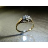 9ct Gold (Birmingham) 1983 Diamond Cluster Ring. Centre stone approx 10pts is surrounded by 6 approx