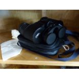 Pair of Russian Binoculars in fitted case with instruction manual and lense cleaner