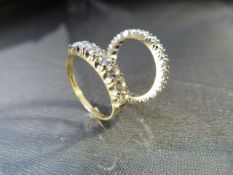 Two 9ct Gold Eternity Rings. (1) 9ct White Gold 3mm Wide band, full eternity ring set with 22