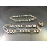Two hallmarked silver bracelets and a silver padlock - Weight approx - 35.8g